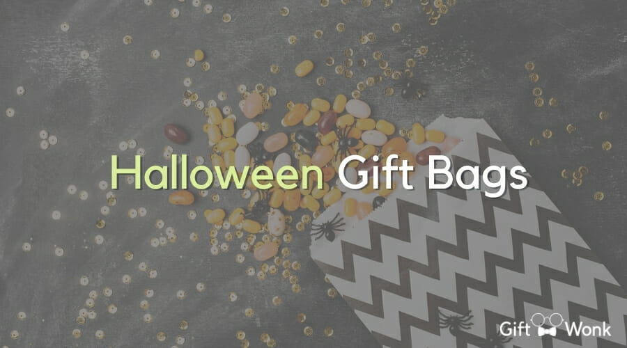 Halloween gift bag title image with a paper bag filled with treats in the background