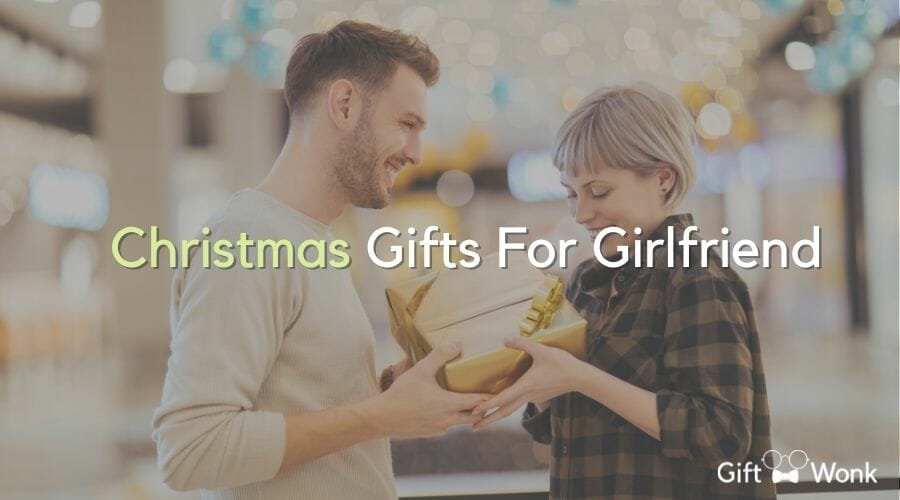 Christmas Gifts for Girlfriends title image with a couple in the background
