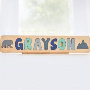 unique Christmas gift ideas for kids a personalized wooden name puzzle with the name Grayson 